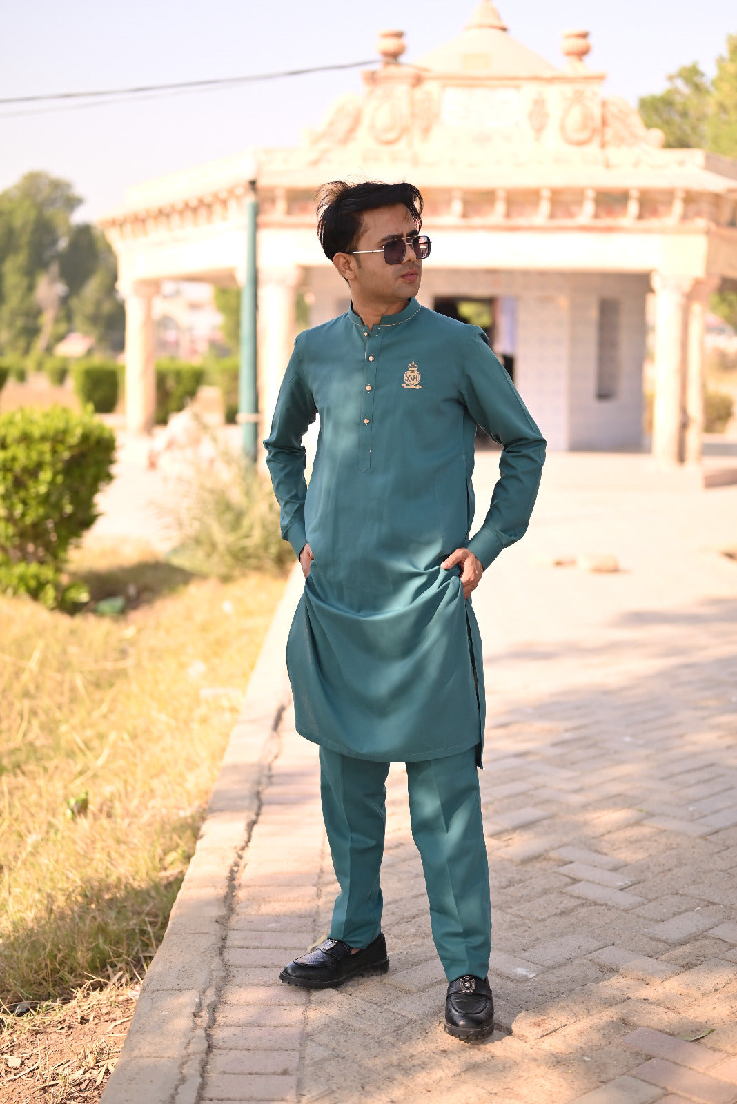 Teal green kurta logo style and trouser decent designing