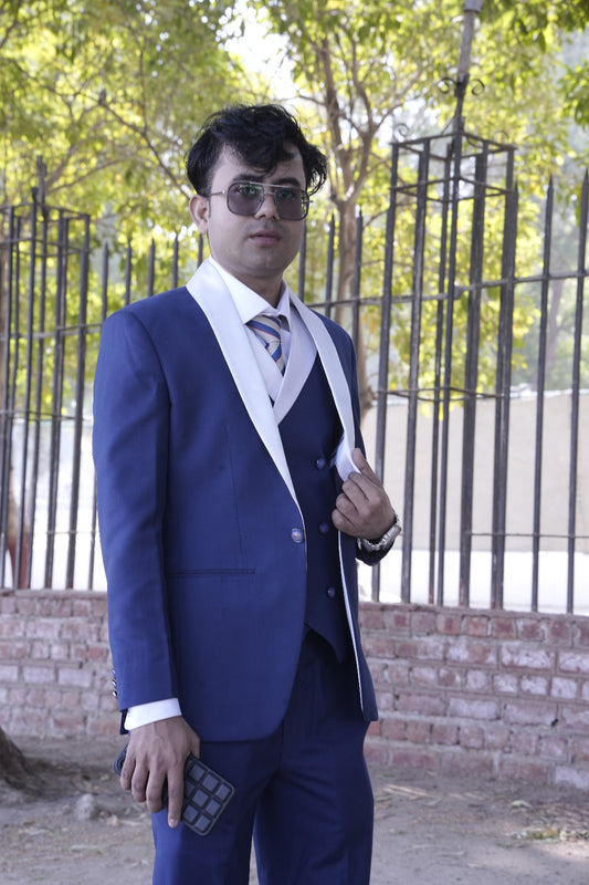 Blue 3 piece suit with white shawl lapel design