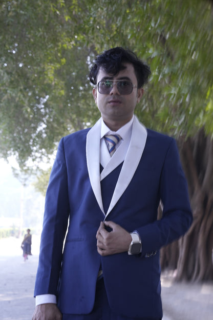Blue 3 piece suit with white shawl lapel design
