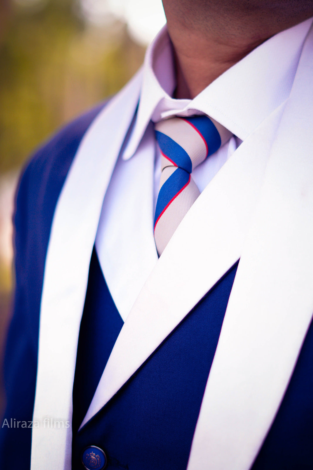 Blue 3 piece suit with white shawl lapel design