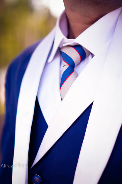 Blue 3 piece suit with white shawl lapel design