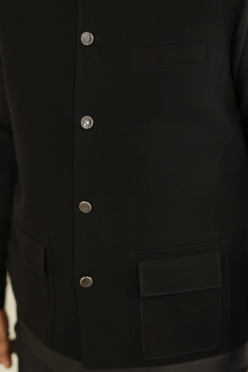 Black jorjutt waistcoat with kameez shalwar design