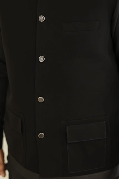 Black jorjutt waistcoat with kameez shalwar design