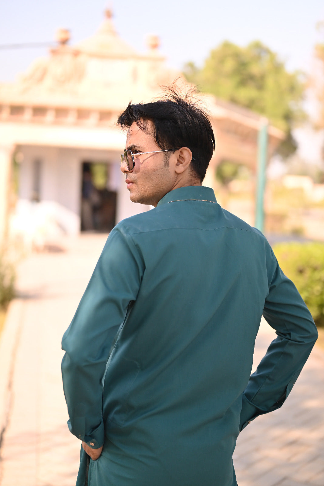 Teal green kurta logo style and trouser decent designing