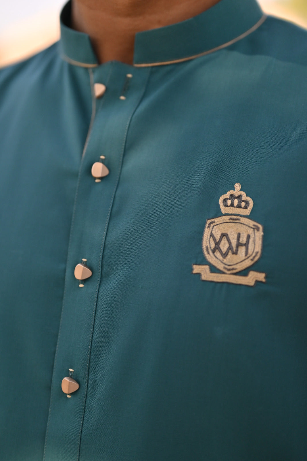 Teal green kurta logo style and trouser decent designing