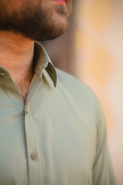 Sage green kameez shalwar decent detailing