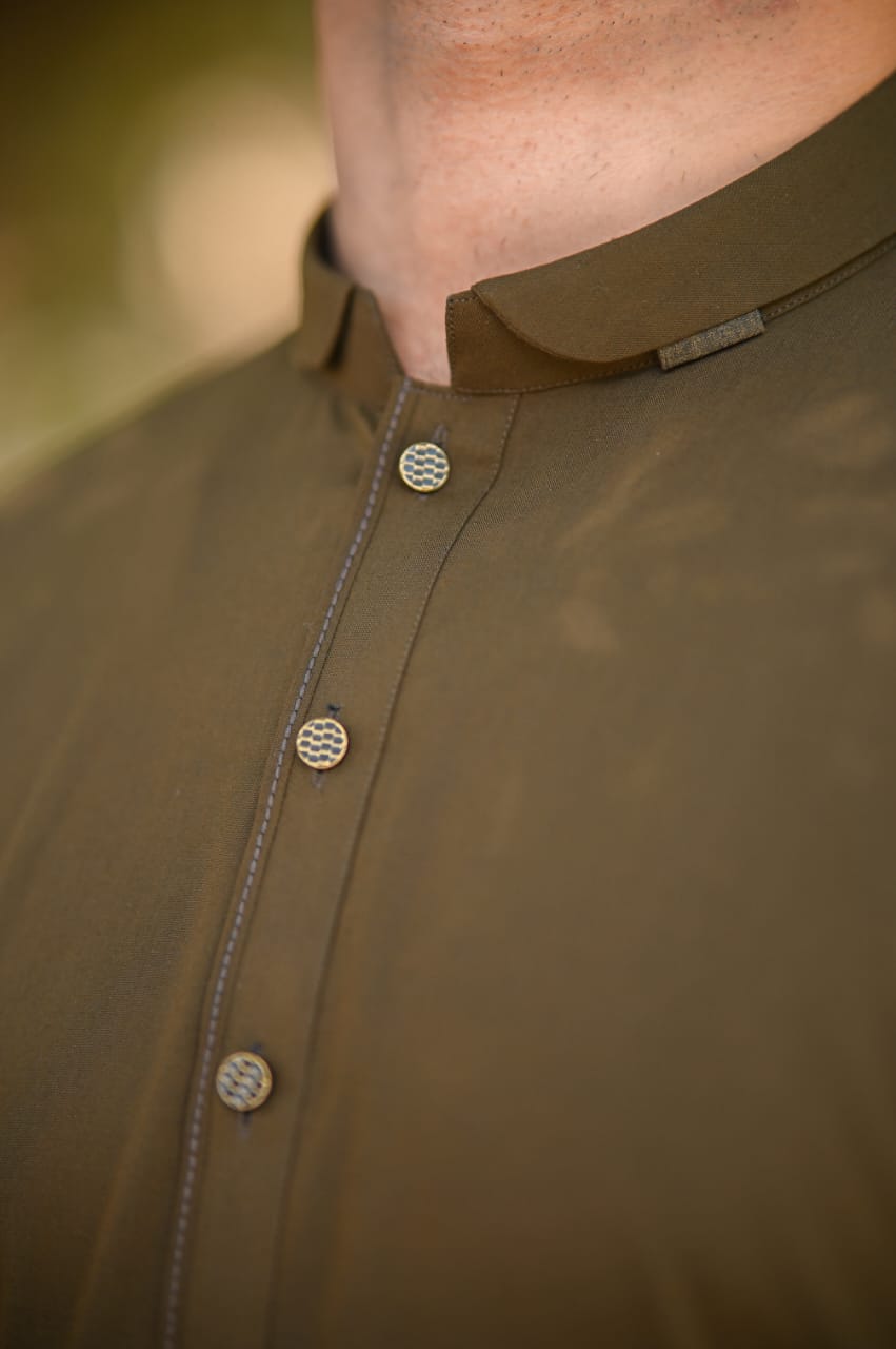 Mahndi green shalwar kameez decent detailing