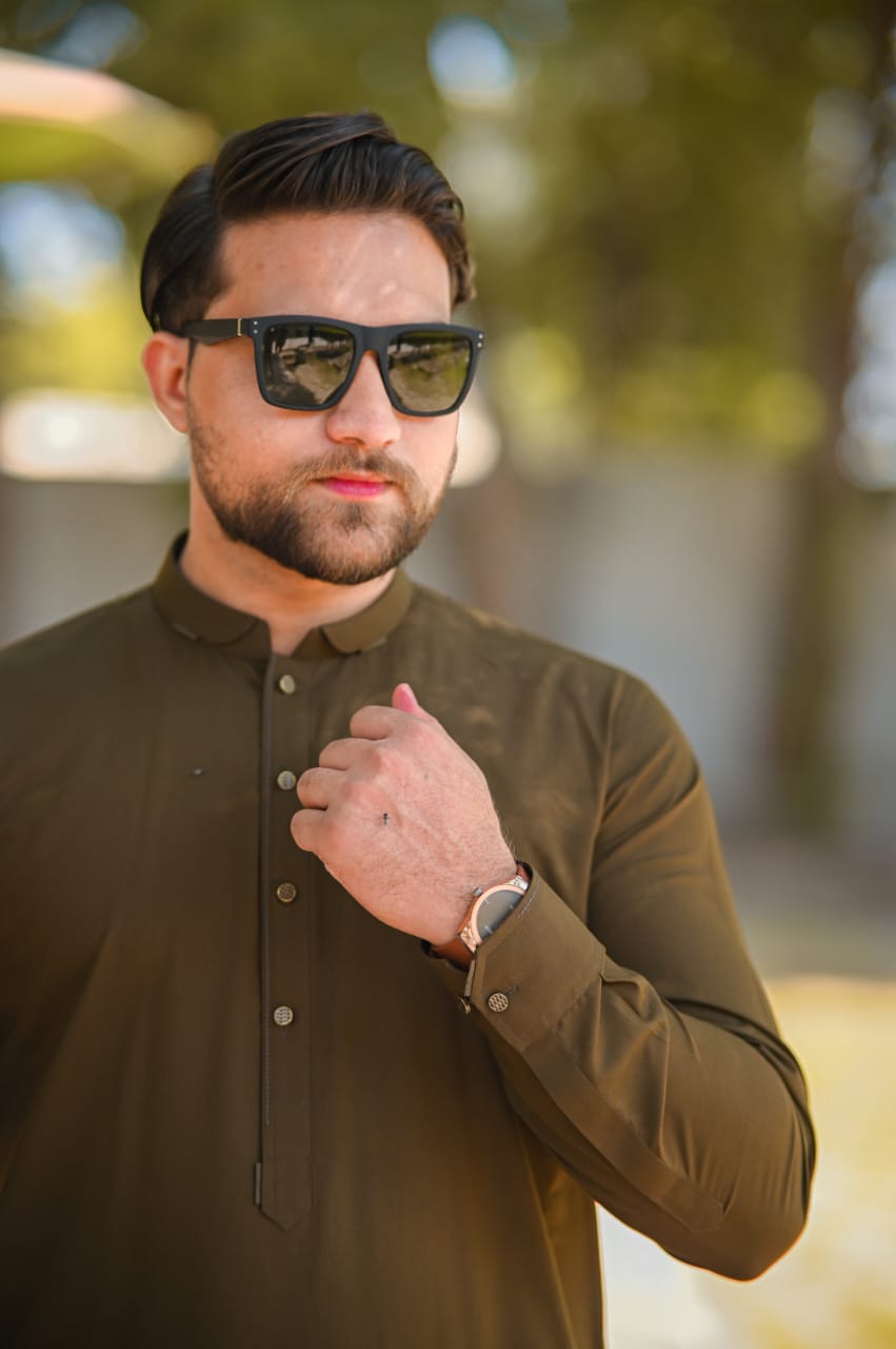 Mahndi green shalwar kameez decent detailing