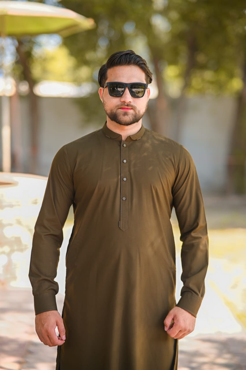 Mahndi green shalwar kameez decent detailing